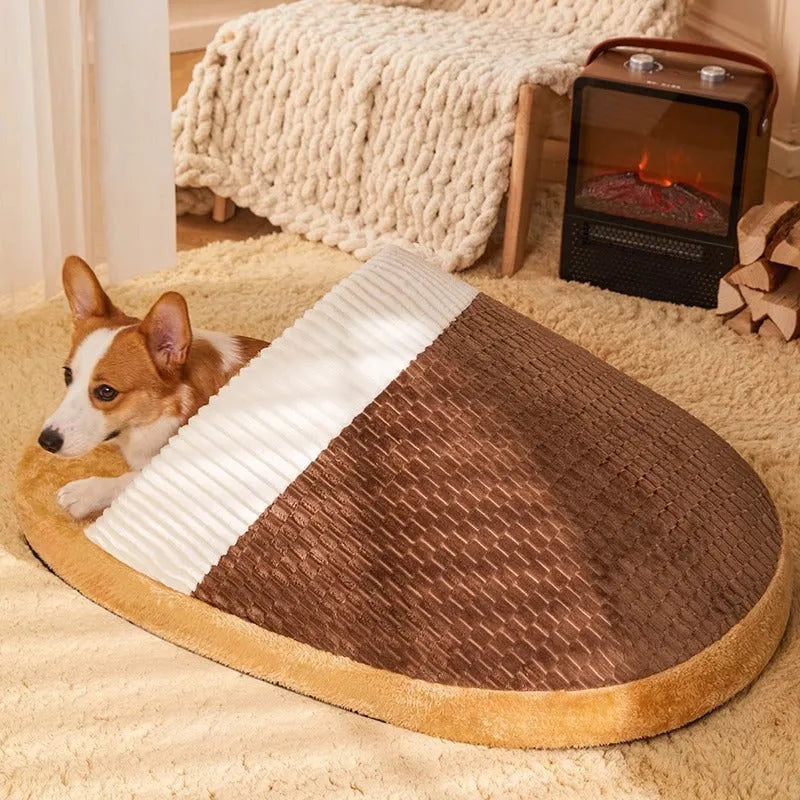 Blue dog nest sleeping bag with removable cover, shown in a medium size.