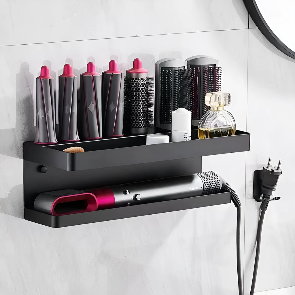 White two-layer aluminium punch-free bathroom storage rack mounted on a wall holding hair curlers.
