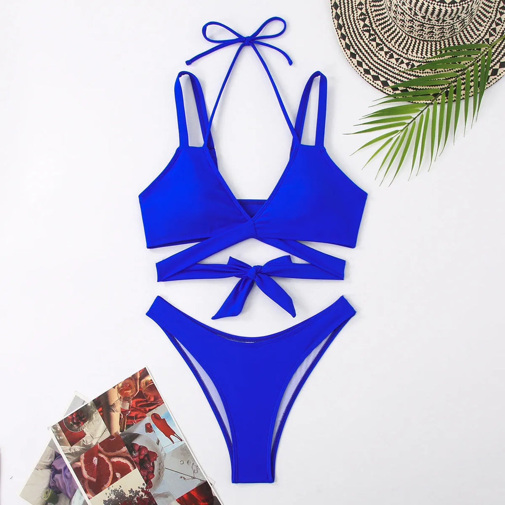 Women's solid colour strap bikini swimsuit in black, red, blue, rose red, or white.
