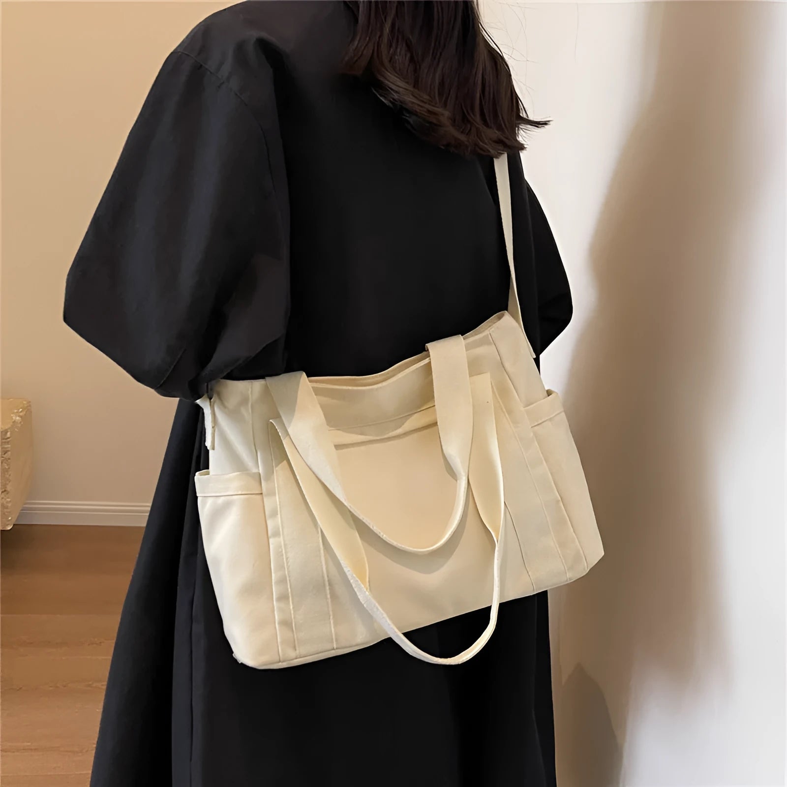 Large capacity canvas shoulder bag with sandwich pocket design in solid colour options