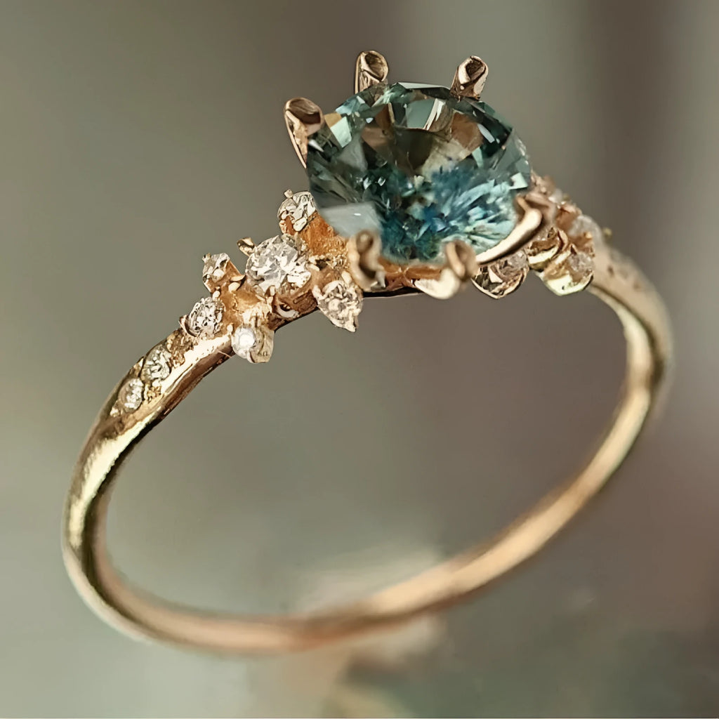 Gold-plated geometric claw ring with micro-inlaid zircon stones on a chamfered square pattern band.