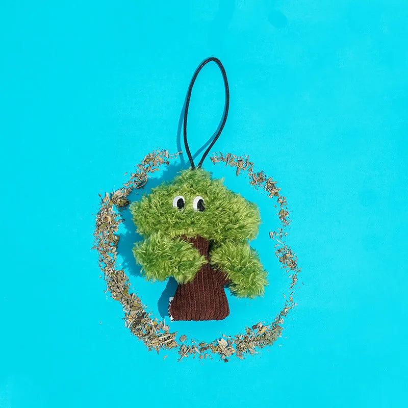 Pine wood cat toy bag pendant with jute hanging cord, filled with catnip.