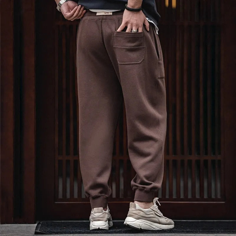 Retro men's tapered ankle-tied sweatpants in dark gray with drawstring elastic waist