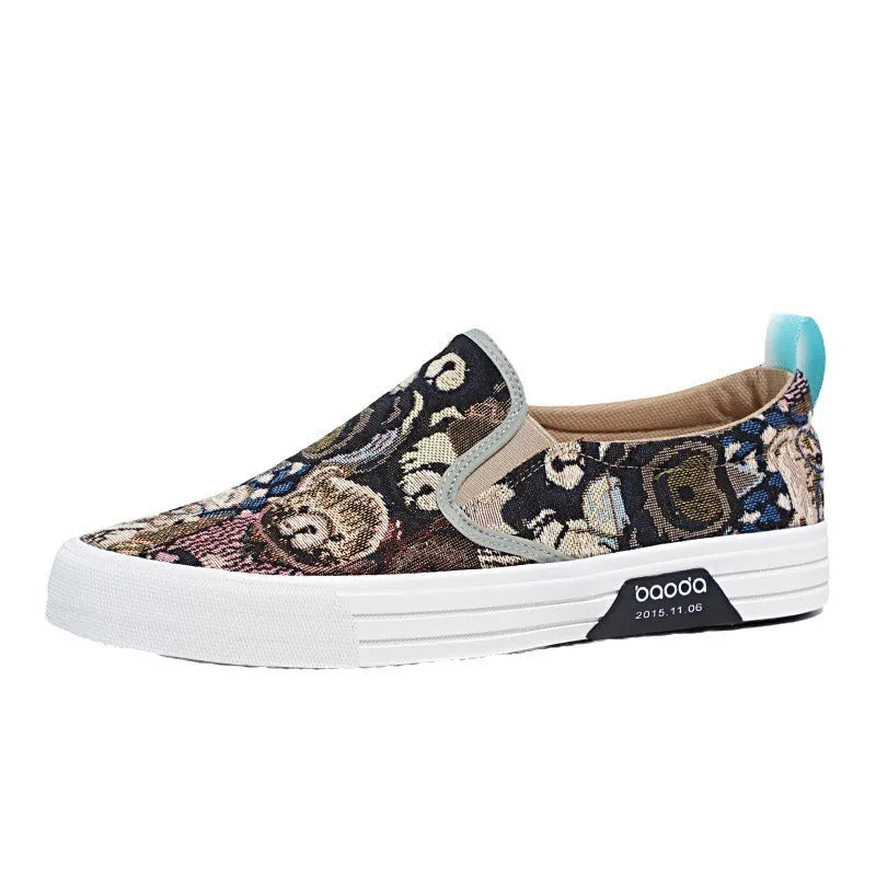 Khaki canvas slip-on sneakers with vulcanised rubber sole and mesh lining on a white background.