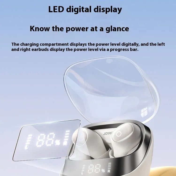 Dawn white wireless in-ear Bluetooth headphones with a matching charging case on a table.