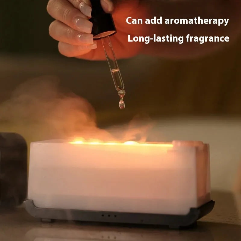 Black or white USB aromatherapy diffuser with simulated flame lighting and jellyfish smoke ring effect.