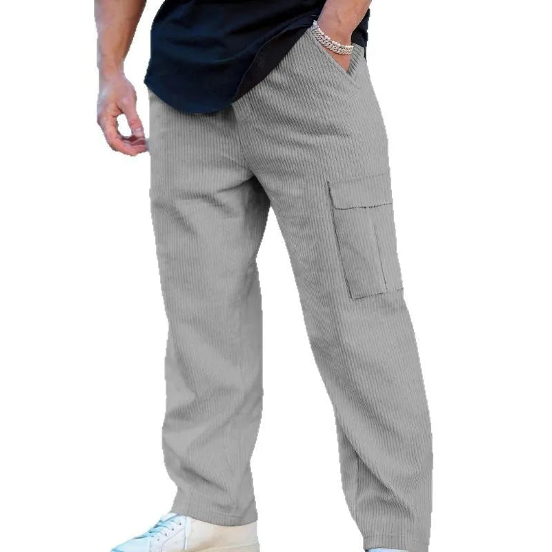 Men's loose-fitting corduroy cargo trousers in army green with a straight leg and drawstring waist.