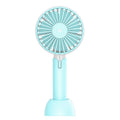 Blue handheld USB electric fan with speed control buttons and oscillation function on desktop