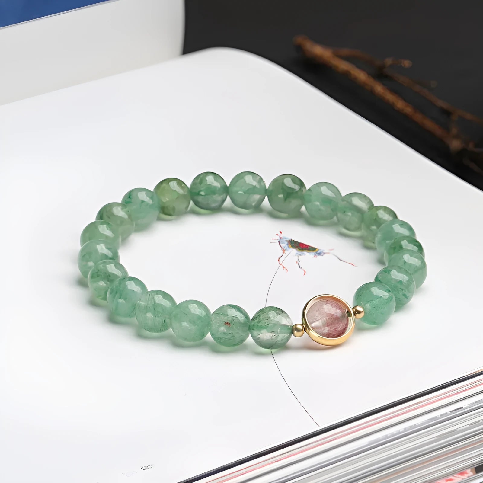 Green strawberry quartz hand-woven bracelet with 7.5mm stones and geometric Chinese patterns