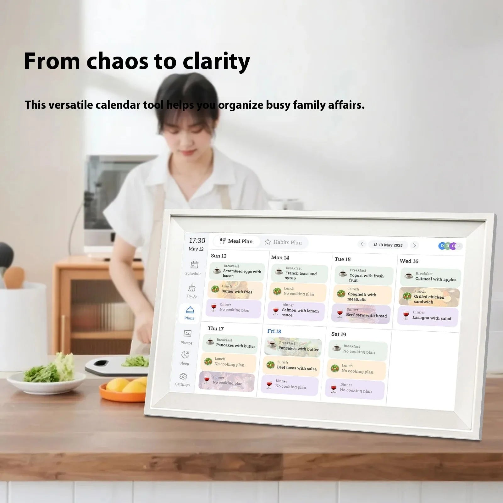 White 15.6 inch digital photo frame displaying family photos on full HD screen