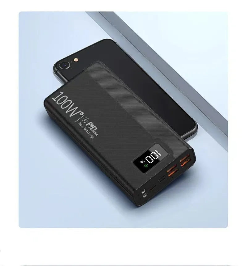 Large capacity power bank in black or white with plastic shell, dimensions 150×76×30-50mm