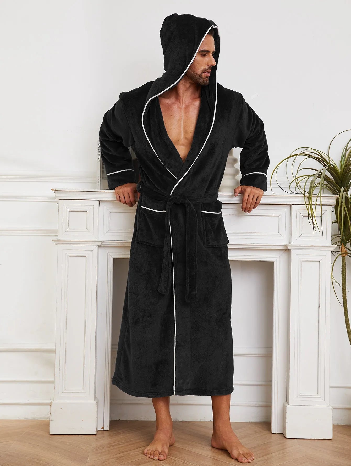 Man in a grey flannel bathrobe, European style, for winter home wear.