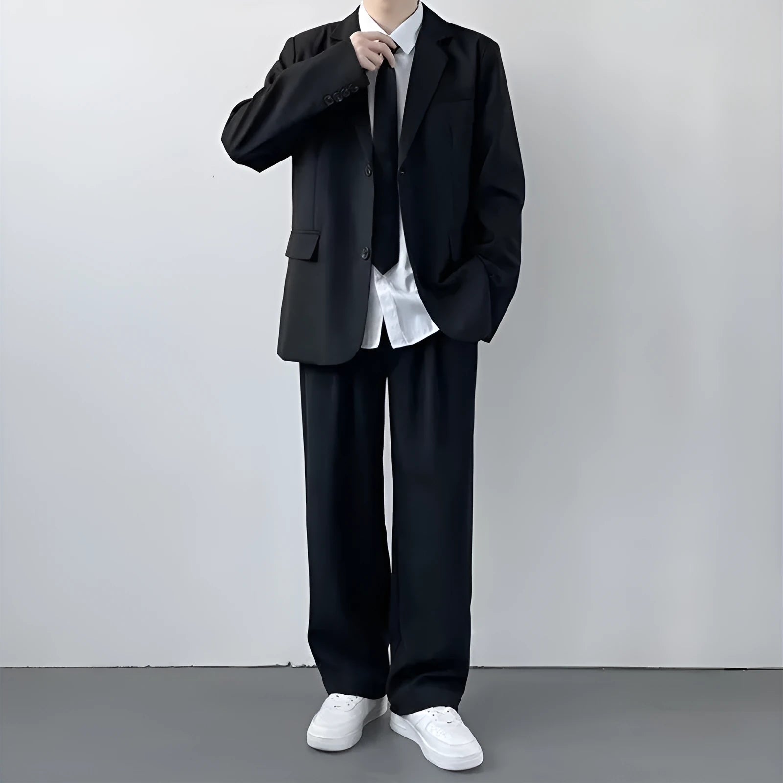 Plus size men's college style suit jacket and trousers set with white shirt and tie on hanger