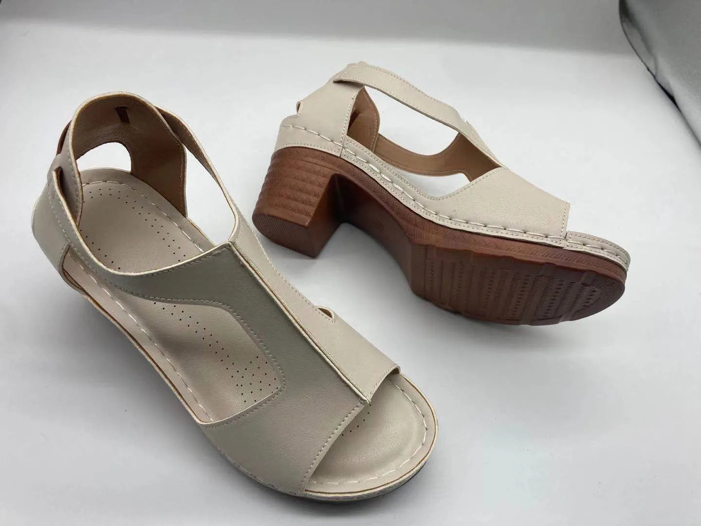 Plus size peep toe wedge sandals with Roman buckle detailing in light brown colour