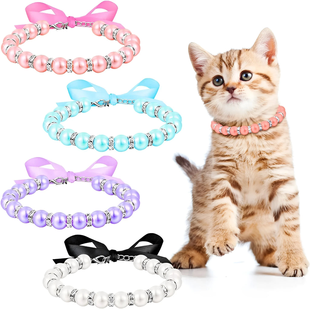 Small dog wearing adjustable pearl and rhinestone necklace with ribbon bow collar