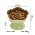Ceramic pet bowl with high foot and neck protector on a flat rim design.