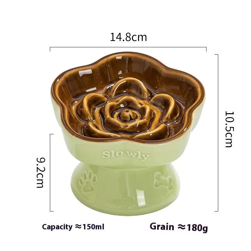 Ceramic pet bowl with high foot and neck protector on a flat rim design.