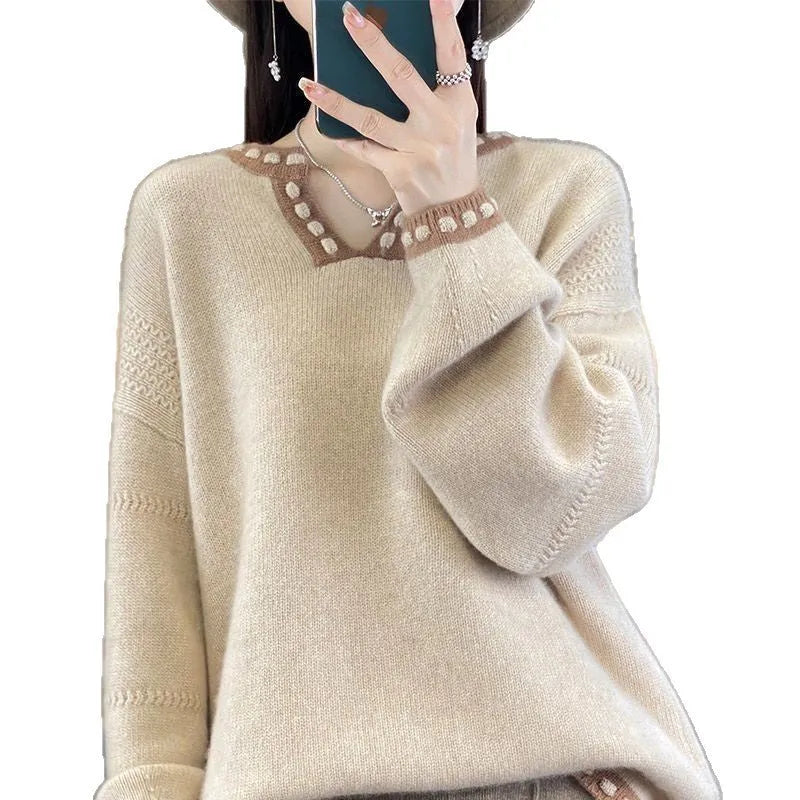 Women's camel coloured V-neck long sleeve pullover sweater made from viscose fibre fabric.