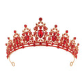 A silver and rhinestone baroque bride crown headdress with intricate detailing on a white background.