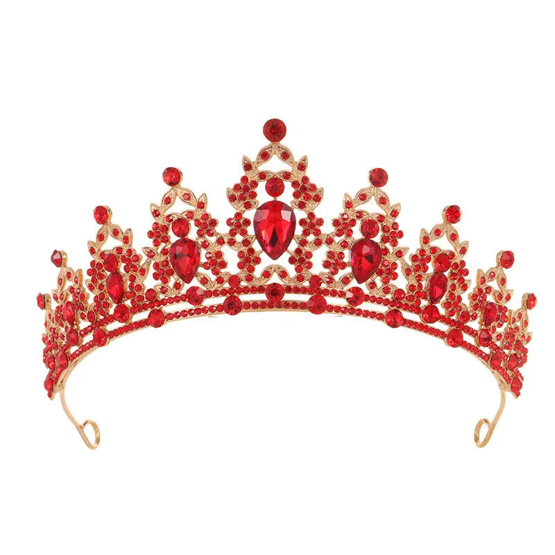 A silver and rhinestone baroque bride crown headdress with intricate detailing on a white background.