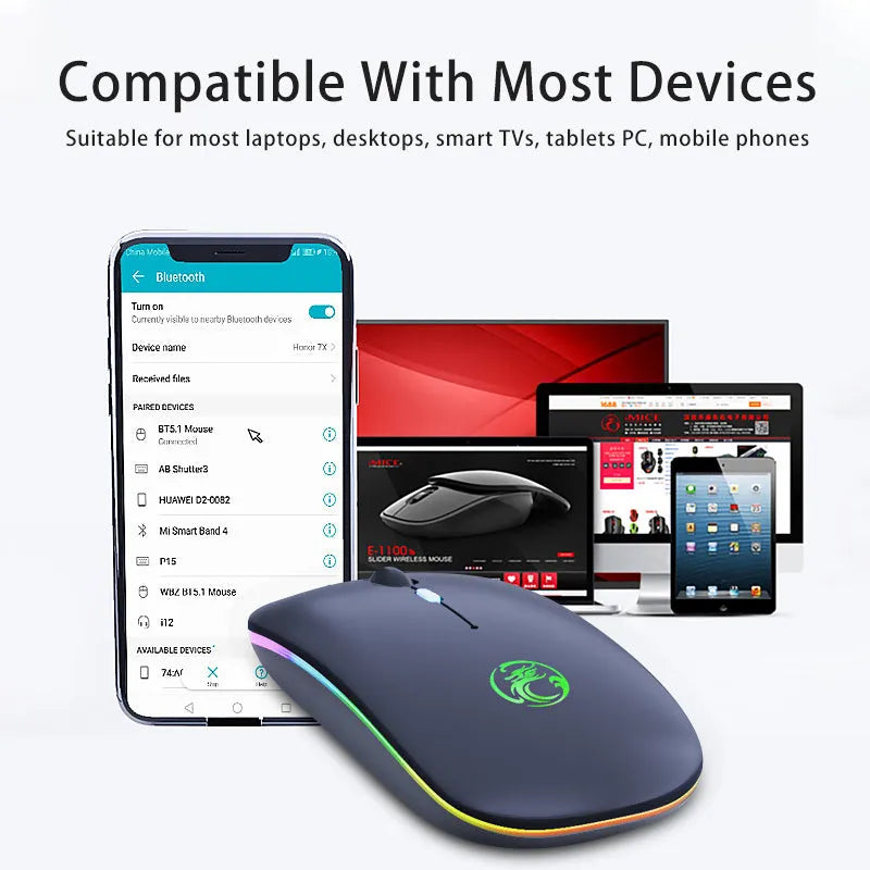 Black and white dual-mode wireless silent mouse with USB charging cable on a desk.