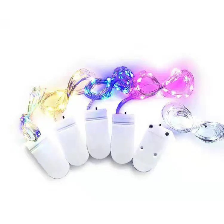 Bendable copper wire LED light string with plastic battery box, showing warm white and white light colour options.