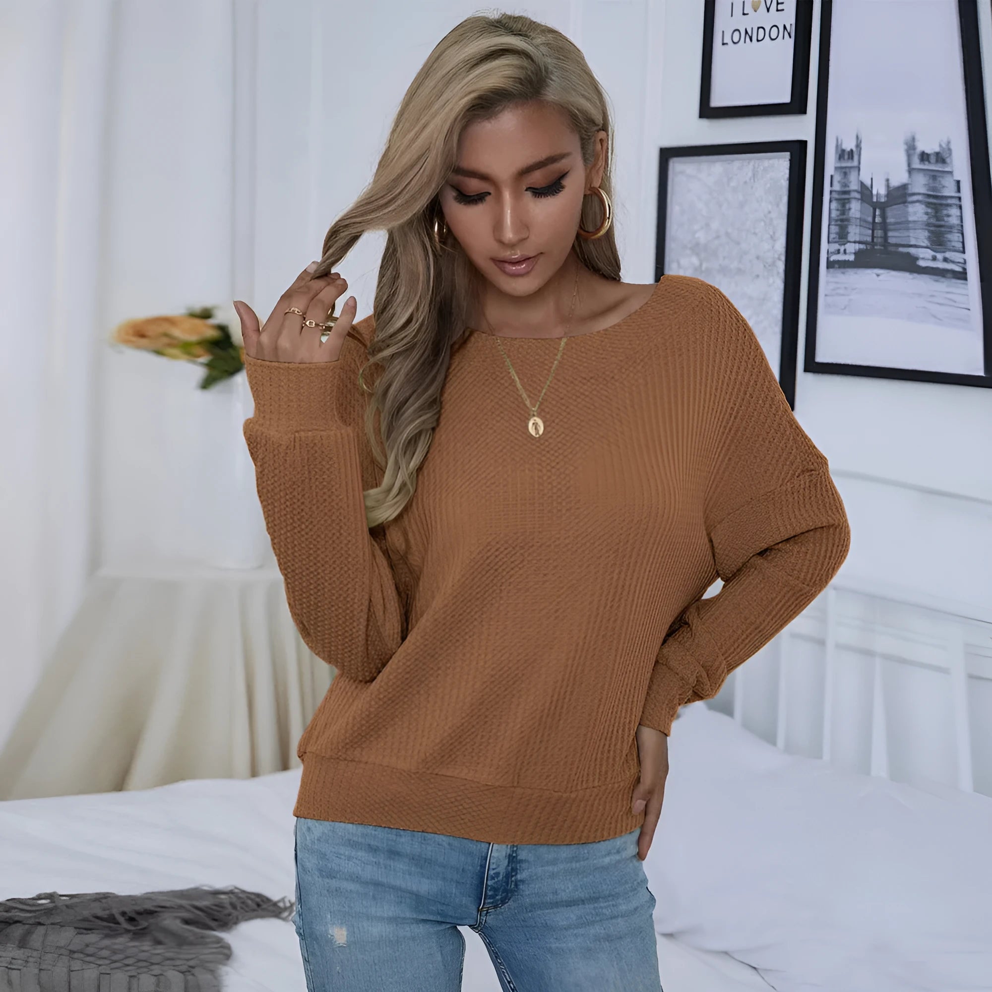 Women's loose casual backless long sleeve pullover in solid brown polyester with drop shoulders