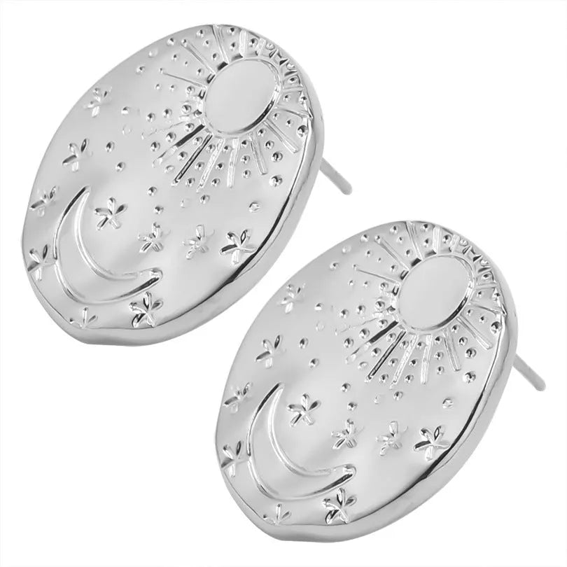 Stainless steel stud earrings with geometric shell design in gold and silver finishes