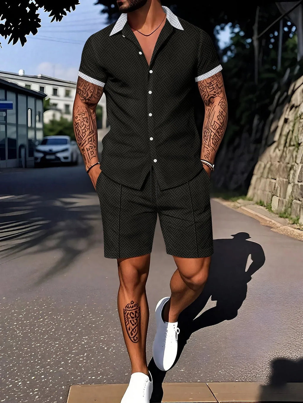 Man wearing a casual short sleeve digital print suit set consisting of a top and matching shorts.