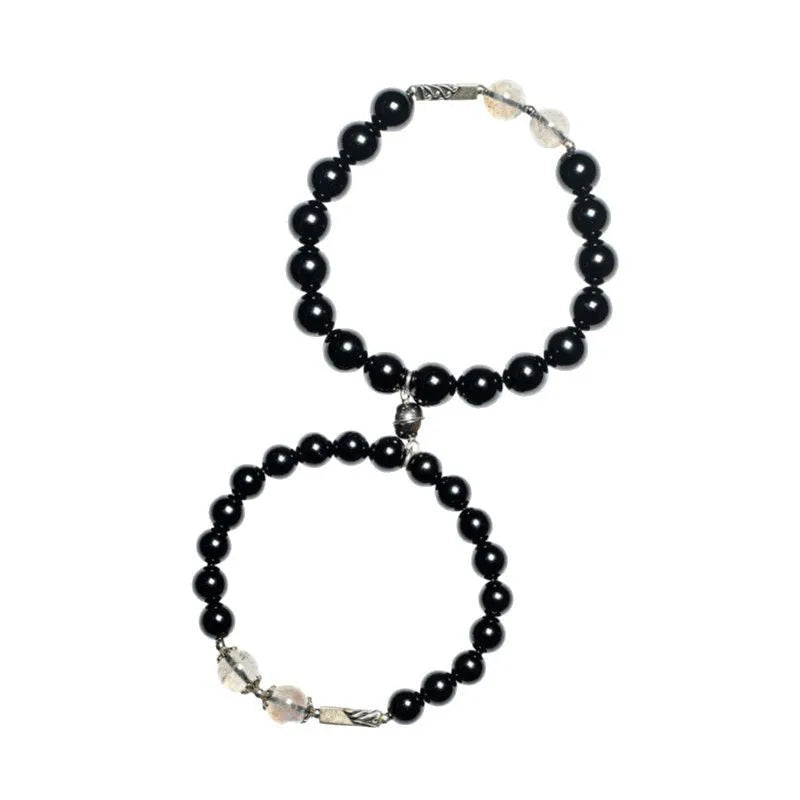 DIY kit with black obsidian Buddha beads, 8mm and 10mm sizes, and cord for a couple's bracelet set.