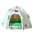 Grey dome-shaped cloth cat tent with a thick padded floor inside, set on a carpet.