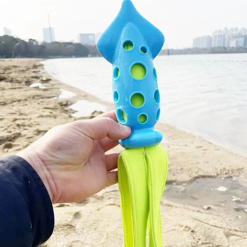 Blue cuttlefish-shaped dog chew toy with squeaky sound device for interactive play