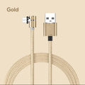 Black L-shaped magnetic USB charging cable with aluminium connector on a wooden table.