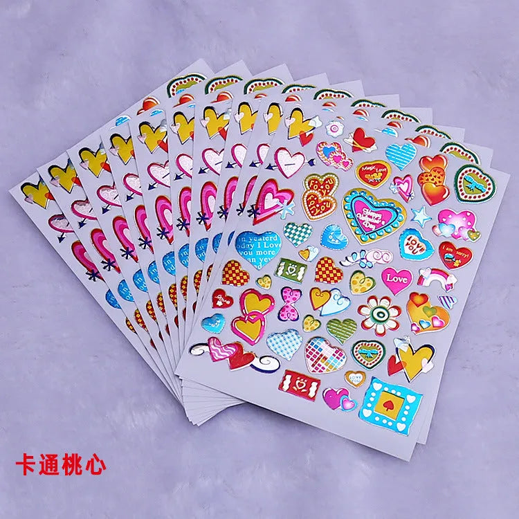Waterproof plastic heart reward stickers with gold gilding and cartoon designs, 100-piece pack