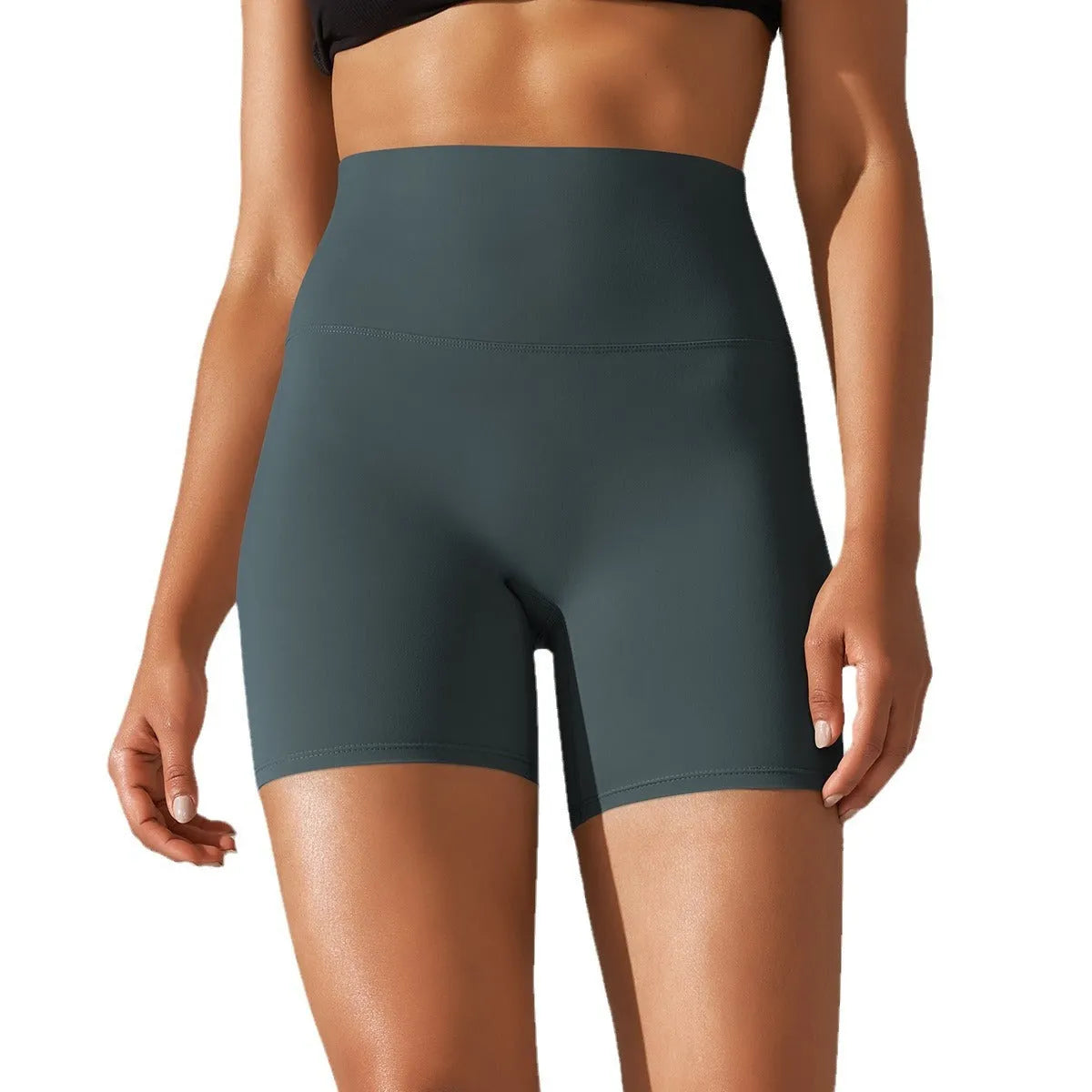 Women's high waist hip lift fitness pants in dark green with moisture-wicking fabric for sports activities