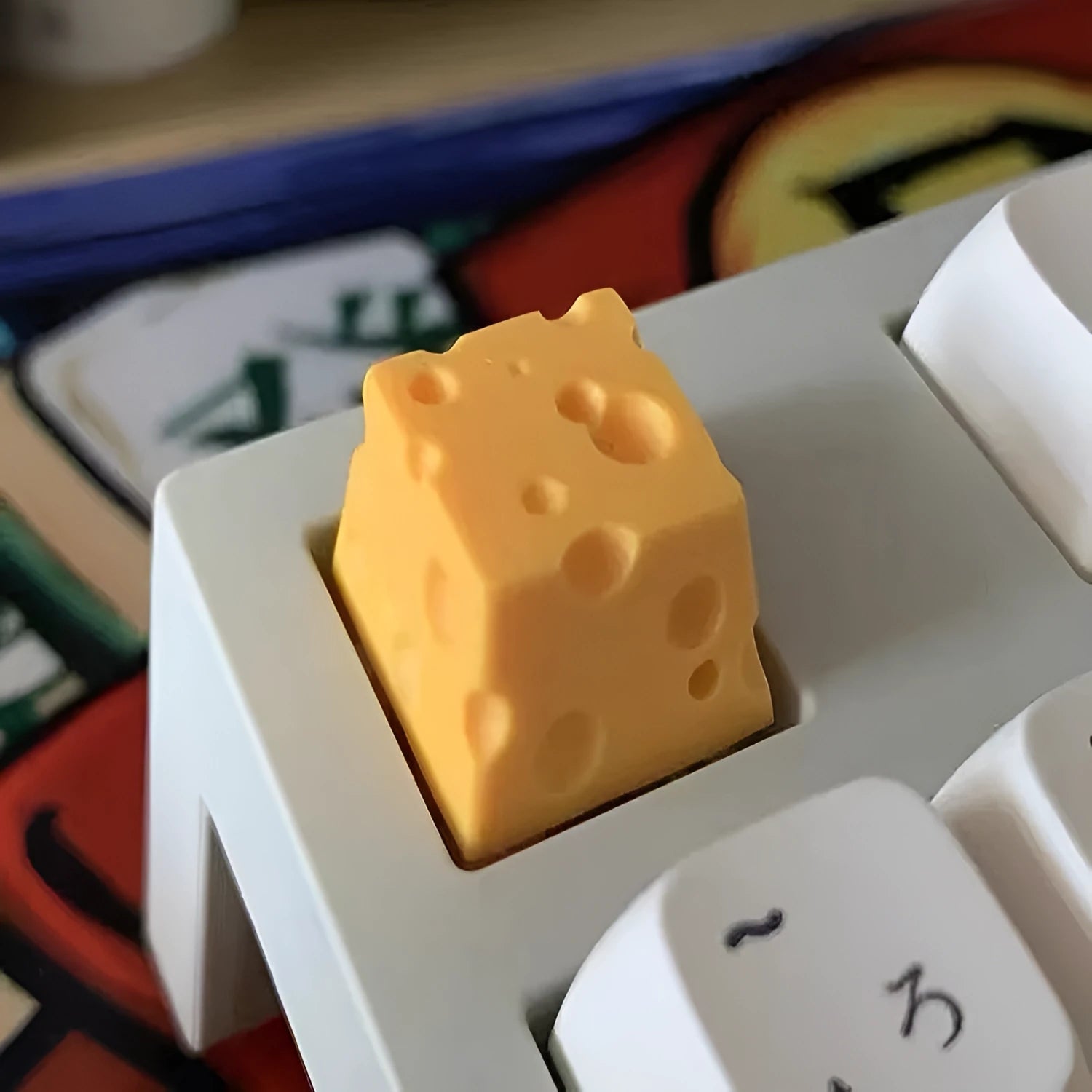 Yellow resin cheese design keycap for mechanical keyboards with Cherry MX switches.