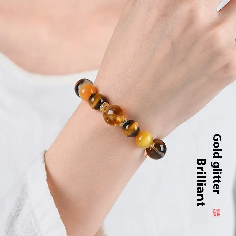 Natural yellow artificial crystal string beads bracelet, 10mm size, on a white background.