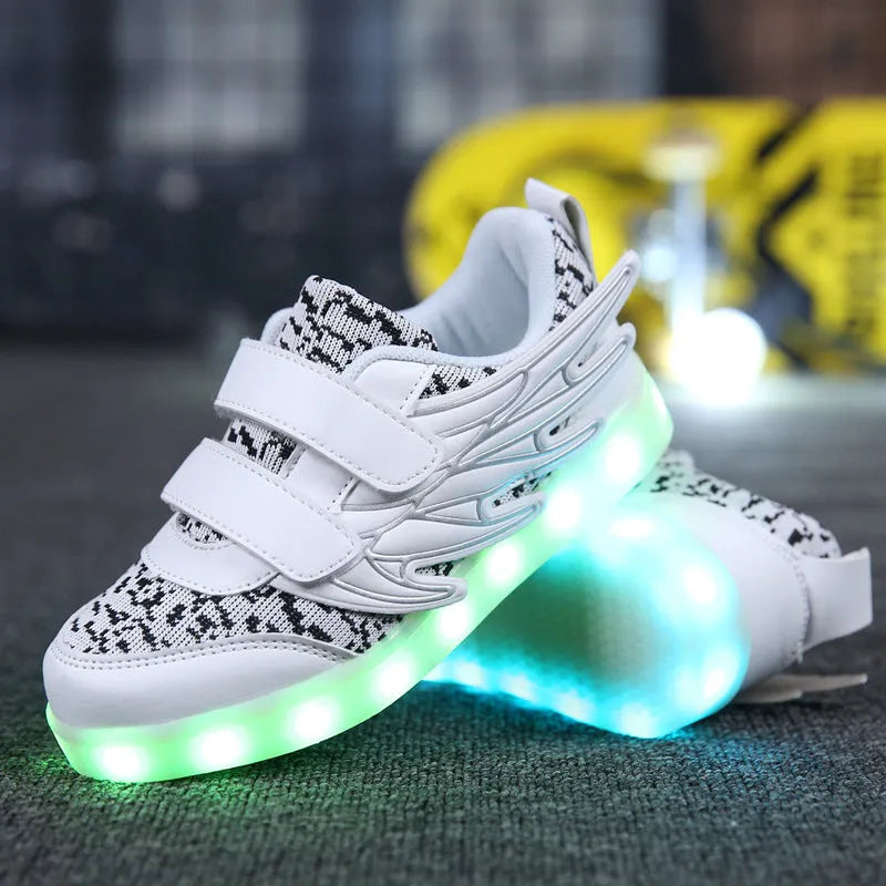 Children's plum red and white light-up sneakers with colourful luminous wings pattern and USB charging port.