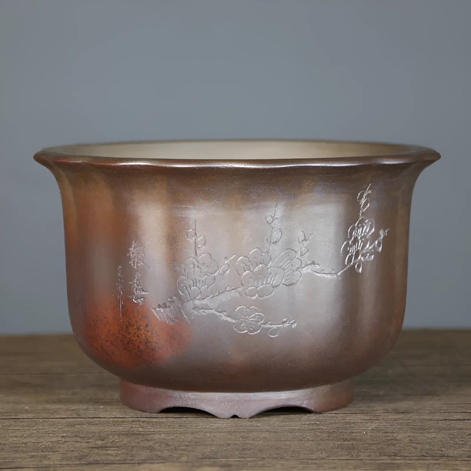 Indoor antique carved purple sand ceramic bonsai pot in large size with wood-grain finish.