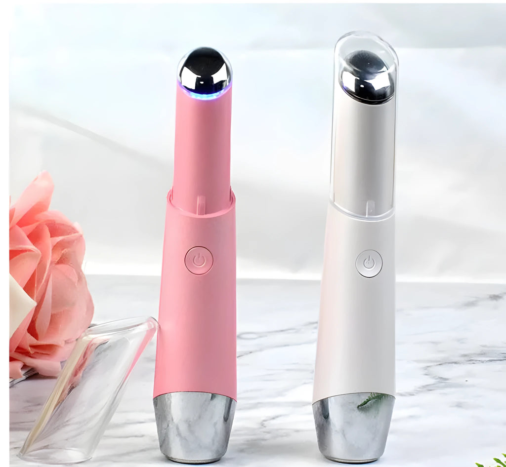 Mini electric eye massager pen in pink and white with vibration and heat for dark circles removal