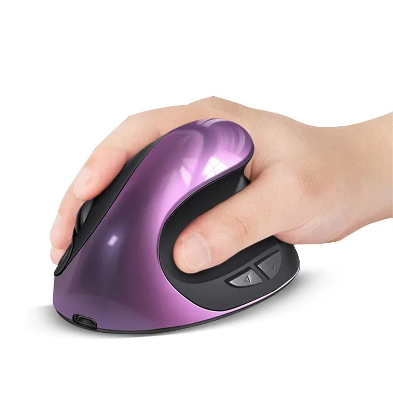 Vertical ergonomic computer mouse in various colours, shown next to a laptop.
