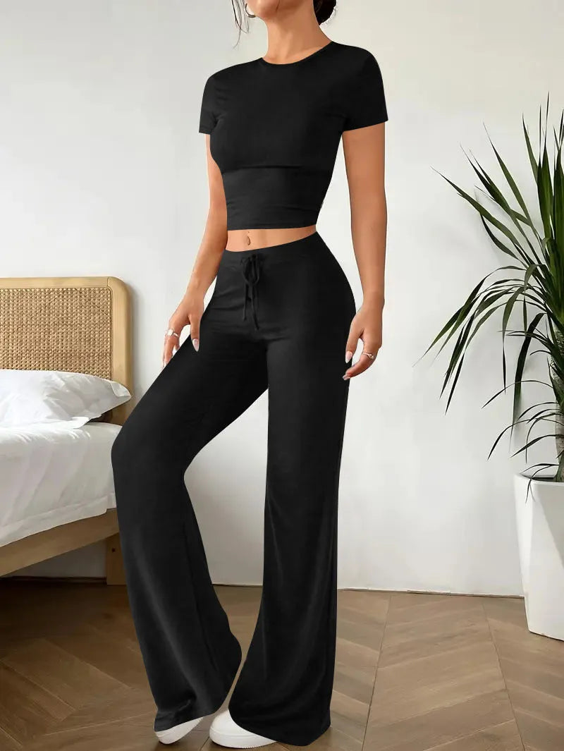 Black women's co-ord suit set with high-waist trousers and short-sleeve t-shirt