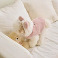 Light pink polyester warm coat for a dog or cat, showing casual costume style.