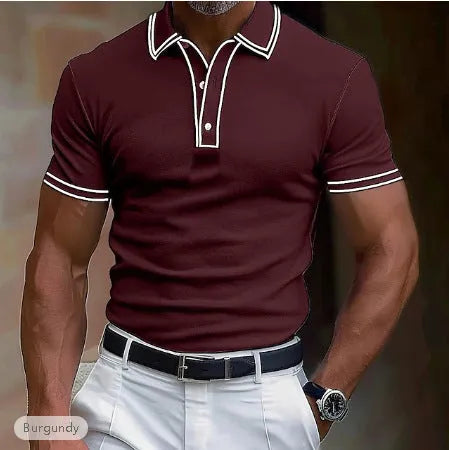Man wearing a loose fit striped short-sleeved T-shirt in a casual setting