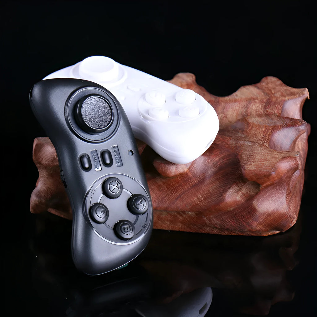 Black mobile game controller Smart Handle 608 on white background, Bluetooth mini gamepad with plastic body