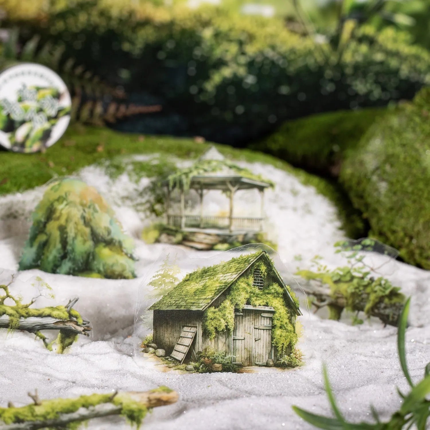 Forest Moss Series DIY decorative sticker set with PEt tape rolls, artificial moss pieces, wooden decorations, and small metal ornaments on a white background