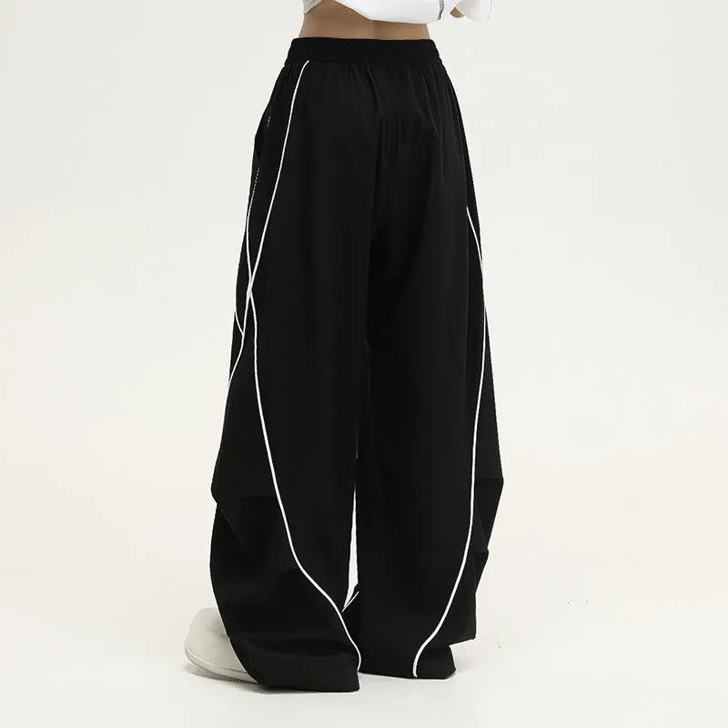 Black striped pleated hip hop wide-leg pants with mid waist and loose fit design