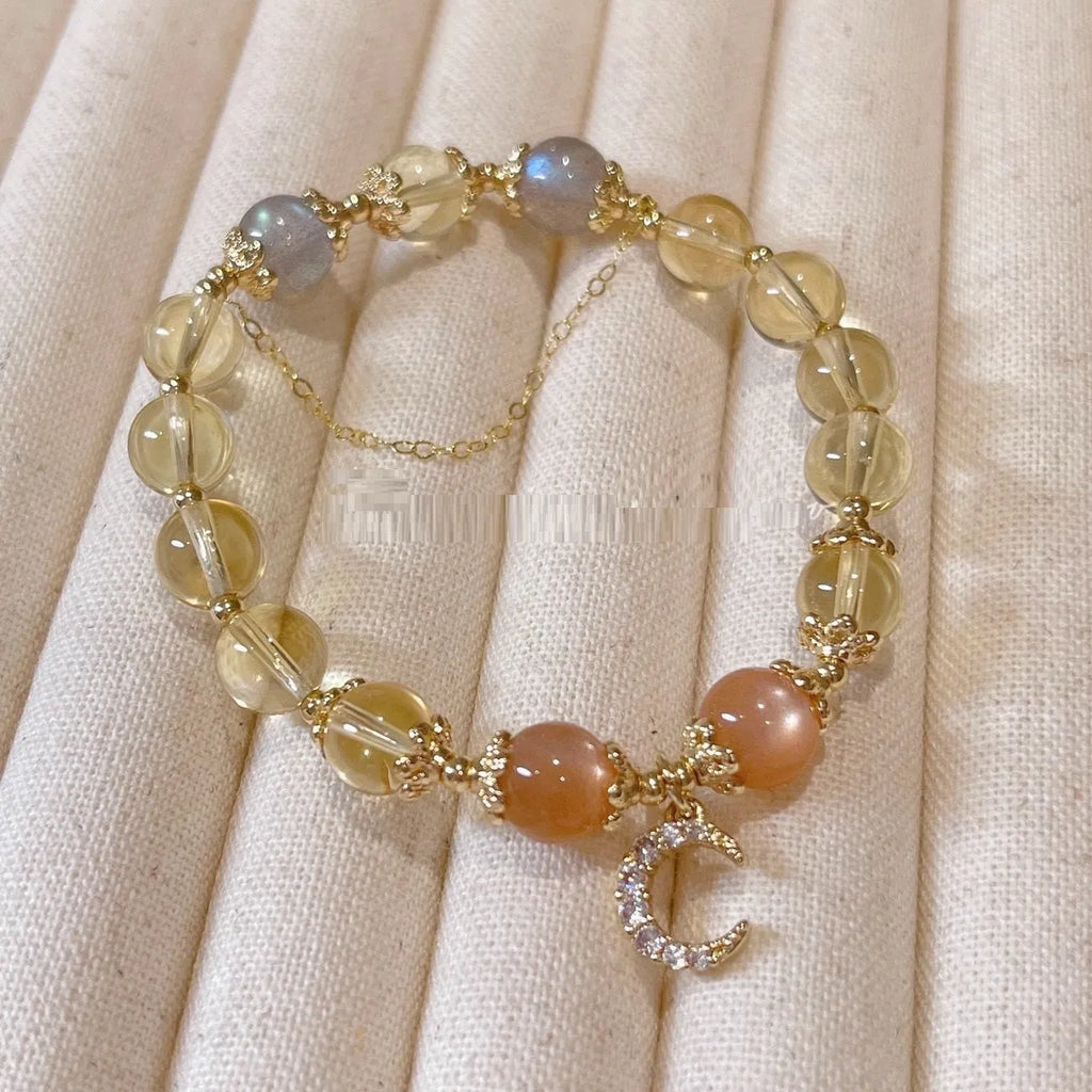 Chinese style women's crystal bracelet with 14K gold electroplating, moonstone, and golden sun stone fortune crystal design