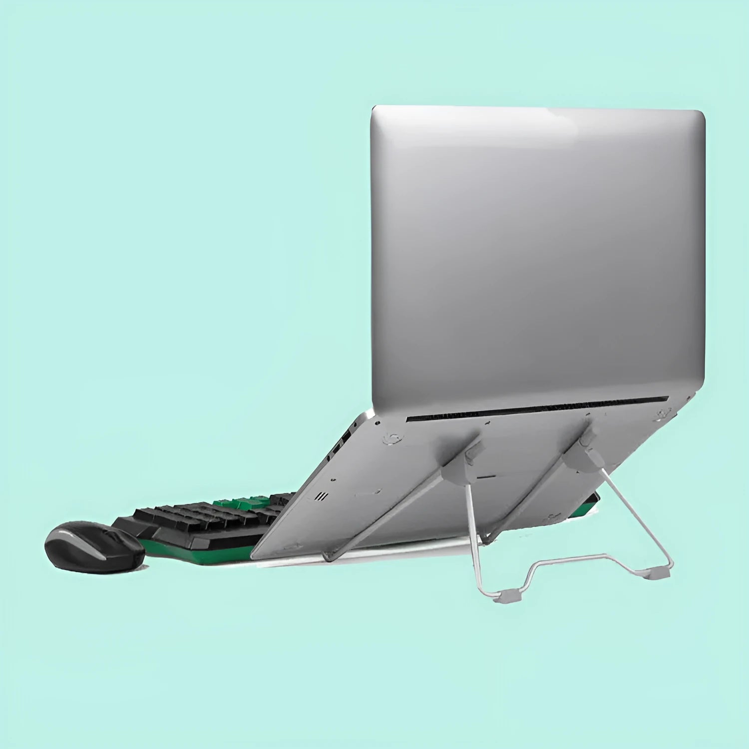 Grey adjustable angle aluminium alloy and plastic stand holding a mobile phone and a laptop on a desk.