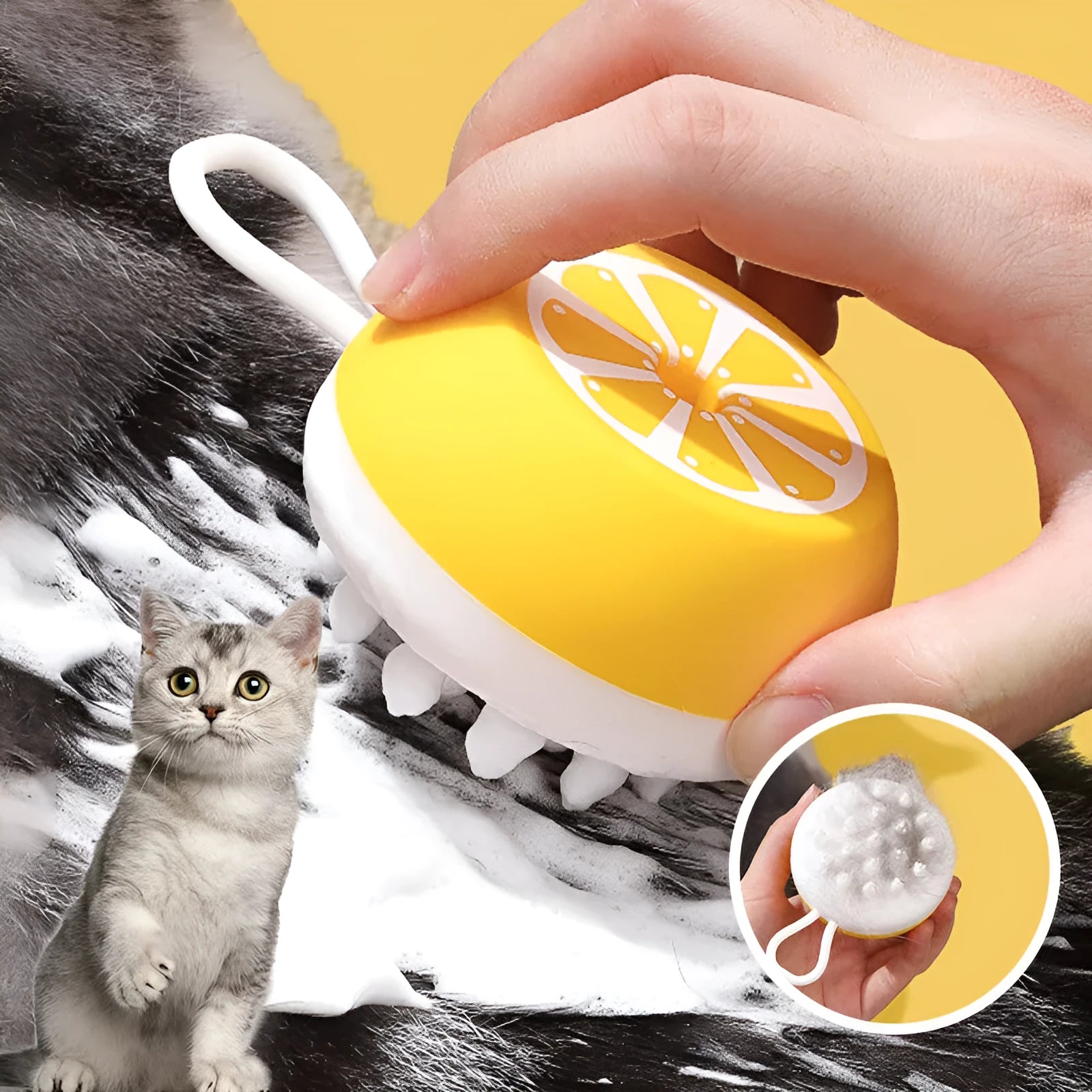 Yellow silicone pet bath brush with massage head on a blue background.
